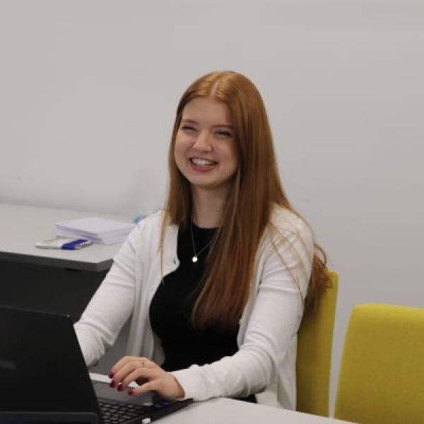 Working at a laptop in an office